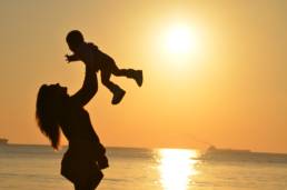 baby-beach-child-mother- sunset