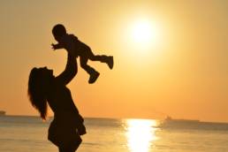 baby-beach-child-mother- sunset